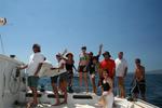 A wave from the Profligate crew. *Photo by Karen Vaccaro S/V Miela.