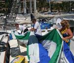 Packing the 'chute. *Photo by Karen Vaccaro S/V Miela.