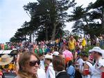 Crowds gather to support the runners.