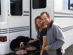 Cherie and Greg cooking breakfast.