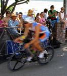 Bikers race by in a blur.