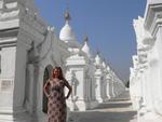 Cherie surrounded by white pagodas.