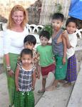 Cherie with local kids. *Photo by Jean Leitner.