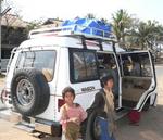 Kids by our rental car. *Photo by Jean Leitner.