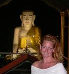 Cherie with the Sehtatgyi Paya (the 10-story Buddha) *Photo by Jean Leitner.