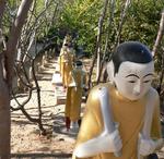 A procession of monk statues. *Photo by Jean Leitner.