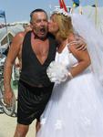 A wedding kiss seals the deal in the Black Rock Desert.