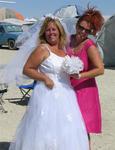 Anne and Cherie pose with the bouquet.  This is as traditional as it gets.