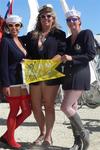 Karem, Anne and Kari hold up the BMYC burgee.