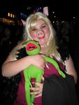 Miss Piggy cuddles her Kermit the frog.