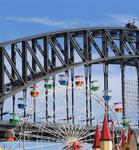 The Ferris Wheel and the Harbor Bridge.