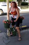 Cherie's more comfortable on the non-motorized "flower" bike.