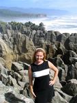 Cherie by the other-worldly eroded layers of rock near Punakaiki, New Zealand.