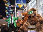 Vistors are welcomed to the magnificent toy store by a guy on stilts.
