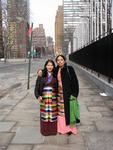 Two Tibetan women join a "Free Tibet" gathering.