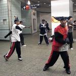 The New York City Float Committee entertains travelers in the subway terminal.