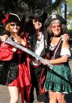 Rennie packs his cutlass and rounds up two wenches (Cherie & Beth) before he boards the 70-ft cat Humu Humu to help raise money in the 2007 Pirates for Pupils Spinnaker Run. 