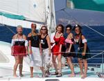 The vixen pirates treat themselves to a complimentary salt scrub, compliments of Banderas Bay. *Photo by Richard/Latitude 38.