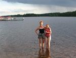 Cherie and Brenda go for a swim in the lake.