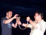 Brad decides he wants to get wet, but doesn't want to go in the lake.  How about a beer bong?