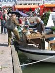 The potato-seller vends his vegetables by the liter.