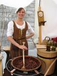 Stirring the nuts on the cobbled streets of Tallinn.