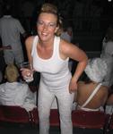 Marjo dances in her white flower cut-out pants.