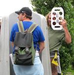 Brian can't let go of his beer holder...even for a pee.