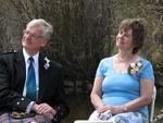 Tim and Irene, Anita's parents, smile in approval.