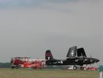 Planes in all shapes and sizes dot the runway at Oshkosh.