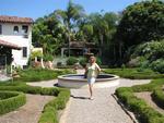 Cherie in Tom & Kathy's garden.  When your friends ask you to water their plants while they are away on vacation, you say yes!