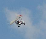 An ultra-light flies over Snow Goose.