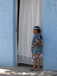 A little girl waits for her signal to start--she's performing in the parade.