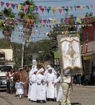 The procession falls in line.