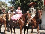 Entire families on horseback.