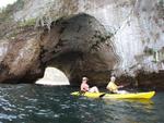 Russ and Scarlett kayak off of Los Arcos.