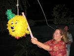 Anne gives the Pooh head a final thunk.