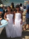 Little girls dressed in white for their first communion.