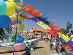 The beach is drenched in color and enthusiasm.