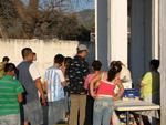 Greg standing in the popcorn line.  (You can also buy chips, churros, cerveza and corn-on-the-cob.)