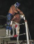 Mistico is "almost" dis-masked, the ultimate punishment.