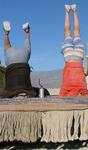 Dean and Brian do head-stands on the Magic Carpet.