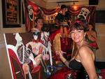 Key West artist Sherry Sweet Tewell painting at Erotic Neurotic 2009.