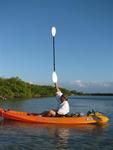 Ray demonstrates how high the storm surge reached in Hurricane Wilma.