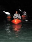 Paddling by the light of glow-sticks.