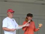 Cherie is asking the crowd to be patient--she's a novice conch blower. *Photo by Regina Lee.