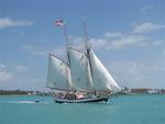 The Liberty Clipper sails by.